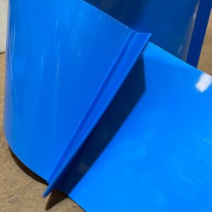 Cinta encamadora con empalme de grapa metálica